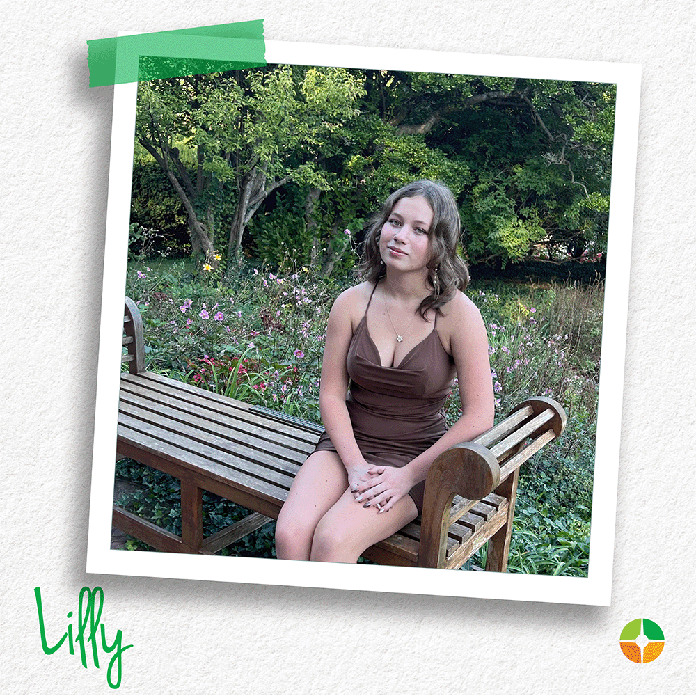 A young woman sits on a wooden bench in a garden setting surrounded by flowers and greenery. Her relaxed pose and thoughtful expression create a calm, confident portrait that highlights natural beauty, grace, and poise. A young woman sits on a wooden bench in a garden setting surrounded by flowers and greenery. Her relaxed pose and thoughtful expression create a calm, confident portrait that highlights natural beauty, grace, and poise.